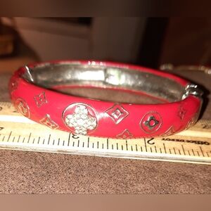 Red hinged bangle bracelet silvertone faux enamel flaw